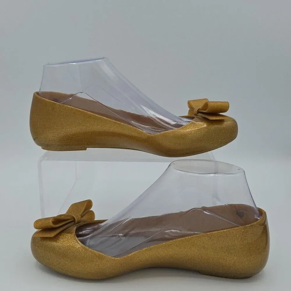 Jason Wu X Melissa Gold Glitter Bow Jelly Ballet Flats Women's SZ 7 Loafers EUC